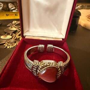 Two tone silver and gold toned watch with a new...